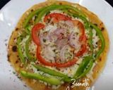 A picture of step 4 of Paratha Pizza.