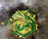 A picture of step 1 of Tomato korma.