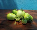 A picture of step 2 of BENGALI STYLE TANGY GREEN TOMATO CURRY WITH MUSTARD SAUCE /KANCHA TOMATOR SORSHE JHAL.