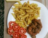 A picture of step 3 of Masalla chicken gizzards, liver n neck #Theme Challenge.