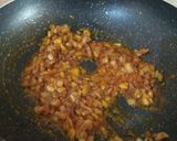 A picture of step 2 of Sev Tamatar Sabji.