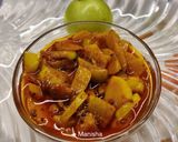 A picture of step 9 of Khatta Meetha Amla Pickle.
