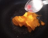 A picture of step 3 of Mango Boba Drink (with homemade mango bubbles).