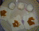 A picture of step 4 of Laddu stuffing bread puwa.