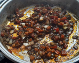 Foto del paso 3 de la receta: Arroz con conserva de chipirones rellenos, en su tinta