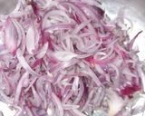A picture of step 1 of Egg Onion pakoda.