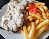 Gombás tejszínes karajszeletek recept fázis 3 fotója