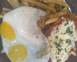Foto del paso 14 de la receta: Milanesas a la napolitana con papas fritas y huevos fritos