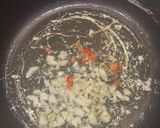 A picture of step 4 of Anchovy and tomato bucatini pasta.