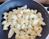 A picture of step 1 of Irish Bombay Potatoes.