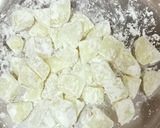 A picture of step 2 of Cheesey Spicy Garlic Potato.