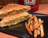 A picture of step 9 of Scrambled eggs and masala fries sandwich.