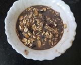 A picture of step 1 of Overnight Oats with Chocolate Nuts and Pomegranate.
