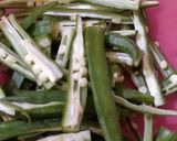 A picture of step 1 of Crispy Bhindi.