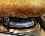 A picture of step 5 of Salt-Grilled Saba with frying pan.