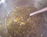 A picture of step 3 of Bathua saag tempered with ajwain,ginger & red chilli powder.