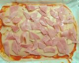 Foto del paso 4 de la receta: Pizza prosciutto con aceitunas negras