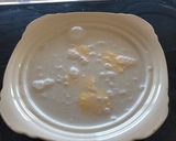 A picture of step 2 of Coconut rice pudding.