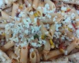 A picture of step 7 of Pink cheese pasta with garlic bread.