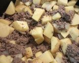 A picture of step 1 of Stovetop Stew Over Ziti Rigati.
