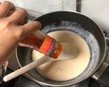 A picture of step 4 of Macaroni cheesy spicy saucy.