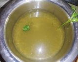 A picture of step 5 of Golgappa with spicy potato-chana masala and spicy flavored water.