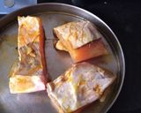 A picture of step 1 of Fish curry with potatoes and cauliflower.