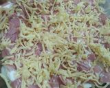 A picture of step 5 of Baked Potatoes with Ham, Cream, and Cheese.