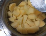 A picture of step 2 of Khatay aloo.