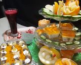 A picture of step 4 of Pomegranate juice and orange trifle.