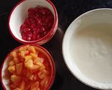 A picture of step 2 of Papaya Anar Raita.