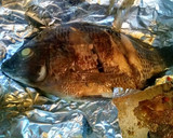 Foto del paso 3 de la receta: Mojarra en papel aluminio!