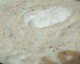 A picture of step 4 of Malai boti pizza with white sauce.