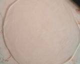 A picture of step 33 of Nawabi veg musallam with laccha paratha tart.