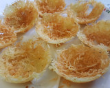 Foto del paso 3 de la receta: Cesta de patatas fritas con huevo, queso y jamón
