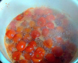Foto del paso 4 de la receta: Confitura de tomates baby en rama con toques de clementinas