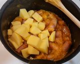 Foto del paso 3 de la receta: Salchichas guisadas con patatas y calabaza al tandoori masala