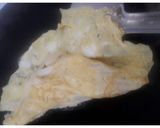 A picture of step 7 of Omelette Sandwich.
