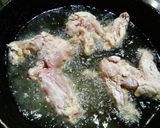 A picture of step 4 of Spicy wings with sauce.
