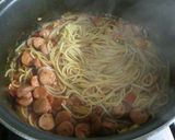 Foto del paso 9 de la receta Fideos con salchichas de viena cocidos en salsa de tomate 