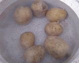 Foto del paso 4 de la receta: Lomo de cerdo al horno con guarnición de patatas salteadas