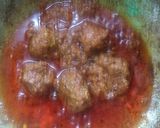 A picture of step 6 of Baigun bodi(brinjal in dried lentil dumplings).