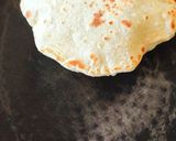 A picture of step 3 of Pita bread with falafel hummus sandwich.