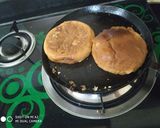 A picture of step 3 of Masala patty Bun sandwich.