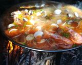 Foto del paso 16 de la receta Paella mixta de conejo y marisco en barbacoa