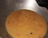 A picture of step 2 of Veg clear soup with sliced boiled egg.
