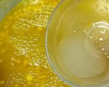 A picture of step 2 of Orange Jelly Pudding Layer in a Glass.