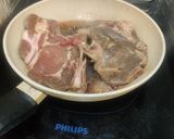 A picture of step 2 of Pork Chop Bistek.