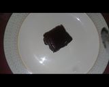 A picture of step 16 of Australian cake.. chocalate toping on vanilla cake.