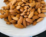 A picture of step 1 of Caramel badam paak (Caramel almond fudge).